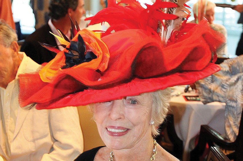Dorothy Lawrence wore a red hat she borrowed from The Players Theatre to Sarasota Yacht Club's Derby party in May. She received an honorable mention in the ladies hat contest.