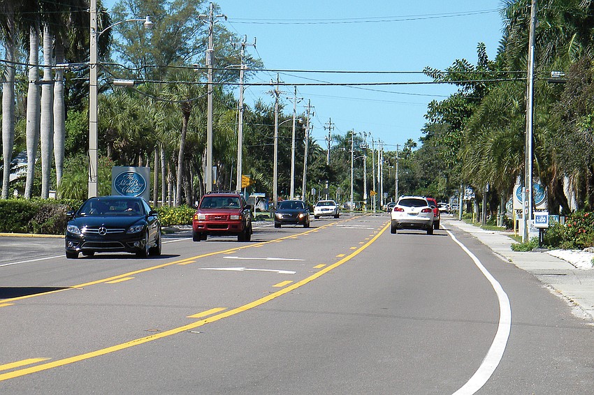 Residents continued to debate a Florida Department of Transportation plan for pedestrian islands on a 1-mile segment of Midnight Pass Road.