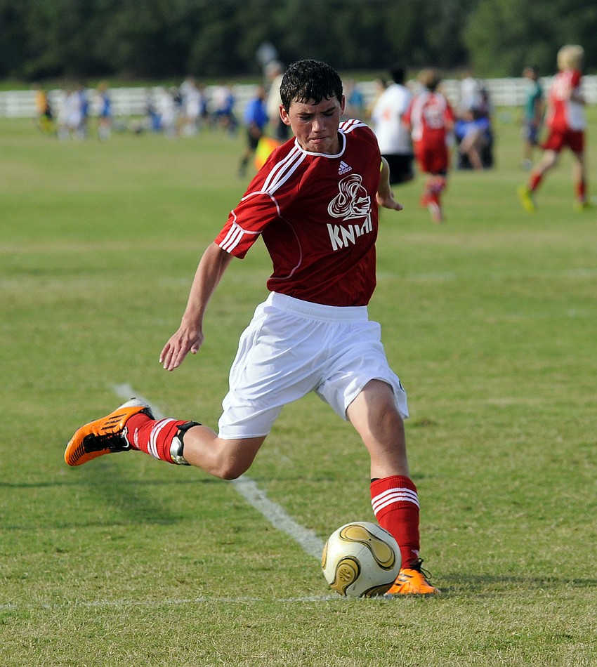 Fourteen-year-old John Thomas launches a goal kick for the North Fort Myers Knights.