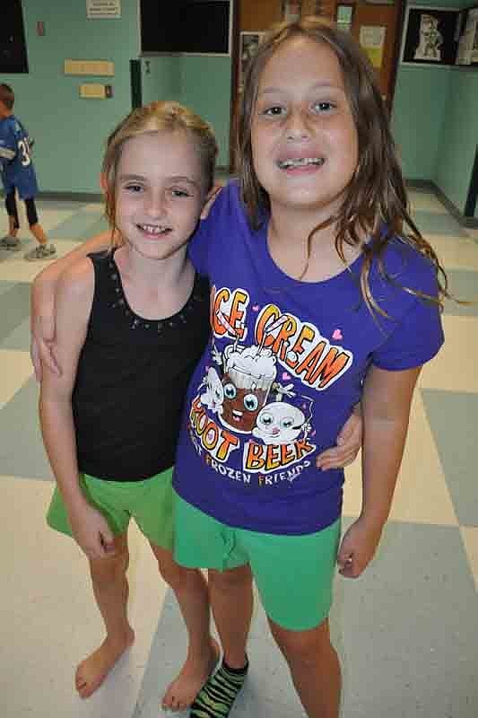 Lizzy Dawson and Gigi Dement are in the same class.