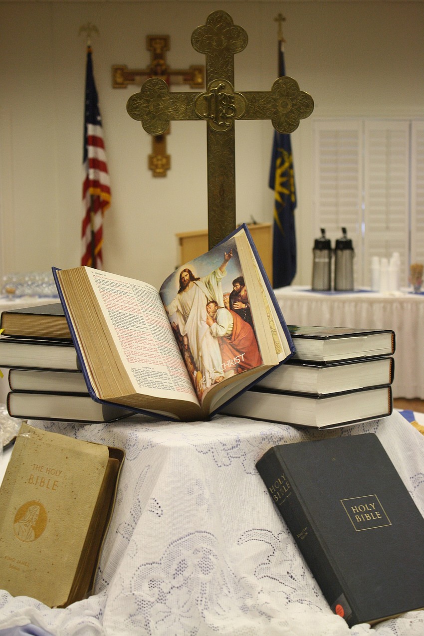 Mary Brown created the display of the King James' Bible for the wine and cheese reception. The King James' version wasn't the first English translation of the bible, but it is the Authorized Version to be read in church.