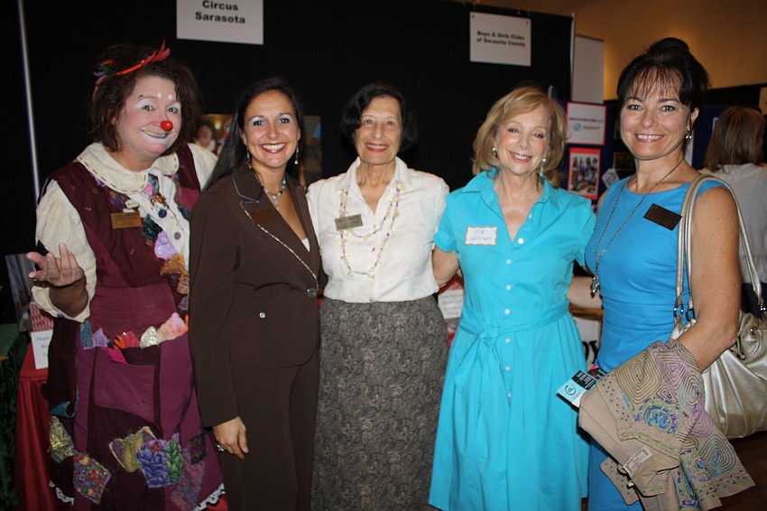 Karen Bell, Jennifer Mitchell and Jennifer Gemmeke of Circus Sarasota pose with Joy Weston of Circle of Community Partnership and Dolly Jacobs of Circus Sarasota.