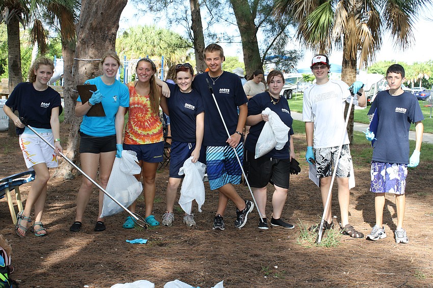 Savannah Long, Emily Pickhardt, Michelle Durr, Ali Brantley, Jacob Sprague, Nikki Cronen, Spencer Lasday and Devon Kozeniaski are Mote Marine high school interns from different area high schools. They joined together to help clean up the bay.