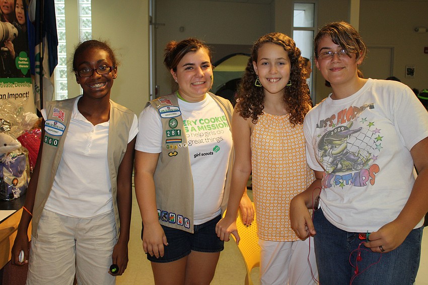 Gabrielle Gillard, Sabrina Mazzie, Emilee Wigglesworth and Tina Muriez pose for a troop 860 photo.