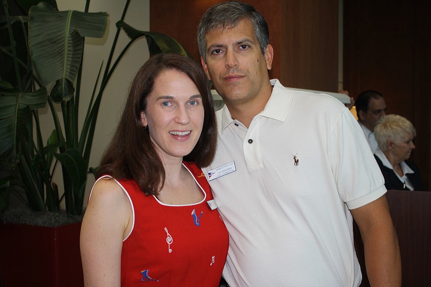 Courtney and Lee Goodman pose for a photo.