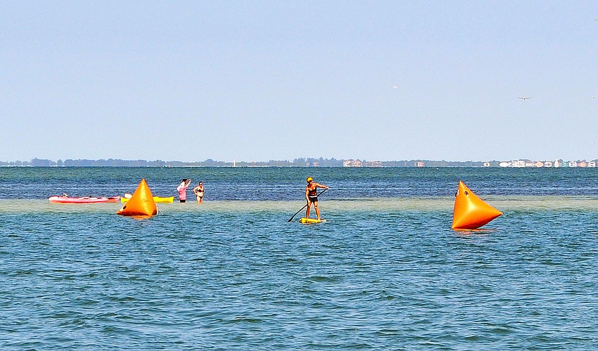 Mindy Quinsey from Tampa was the first woman to cross the finish line and third overall in the sprint race.