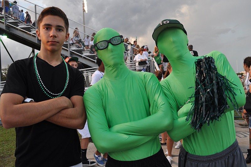 Cole Ringquist caught up with Austin Hunsader and Derek Lersch, who got their special green uniforms for the Homecoming game.