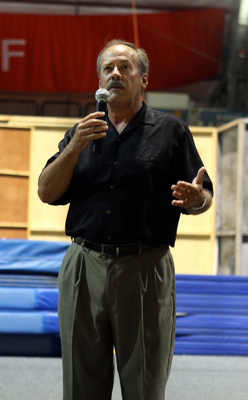 Mitch McKnight, Chairman of the Board, speaks to the crowd.