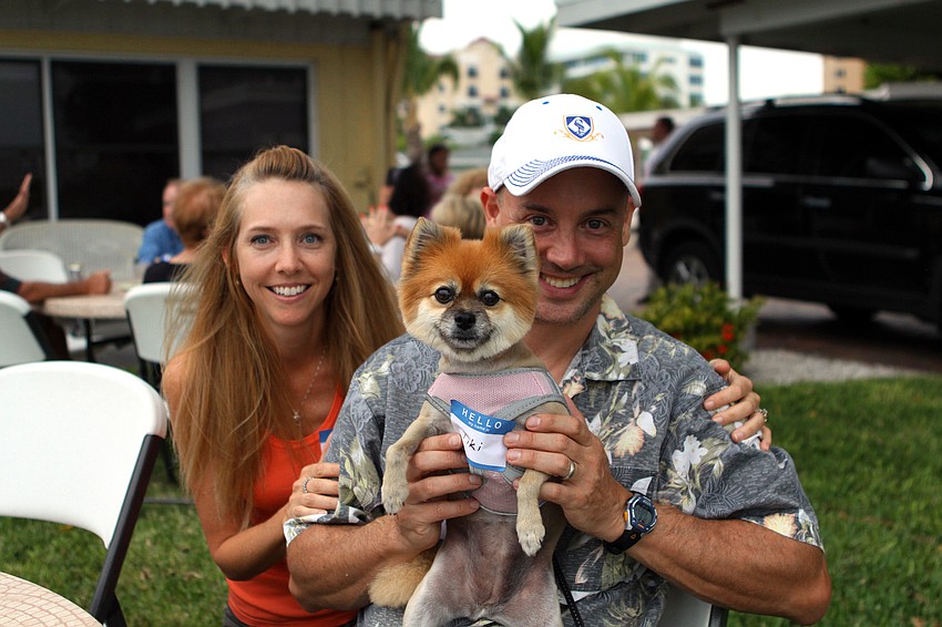 Laura and Eric Christiansen with their dog, Tiki.