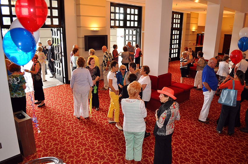 Friends of the Sarasota Ballet wait around for the members of the Sarasota Ballet that went to Washington, D.C. to arrive from the airport.