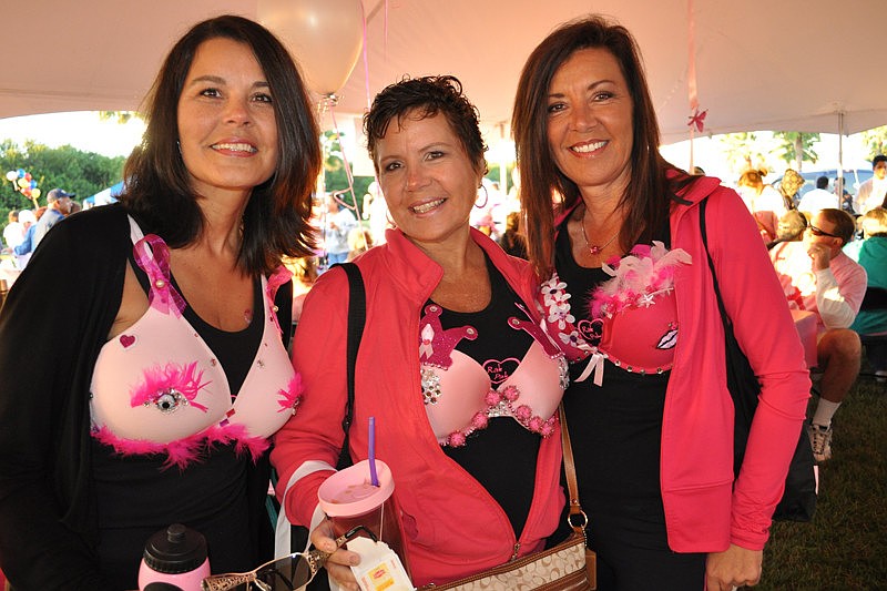 Sisters Maryann Brooks, left, and Donna Everett, right, celebrated their sister, Janet Augello, center, a survivor.