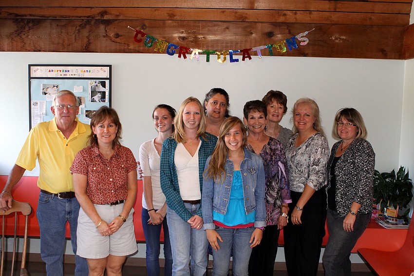 The staff at Beneva Animal Hospital pose together Thursday, Oct. 20 inside the hospital prior to Dr. Janet Whitlock's arrival.