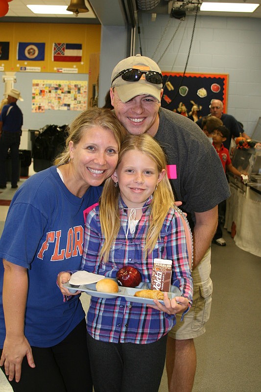 Student Rhien Forbes enjoyed time with her parents. Photo submitted by Therese Rickrode.