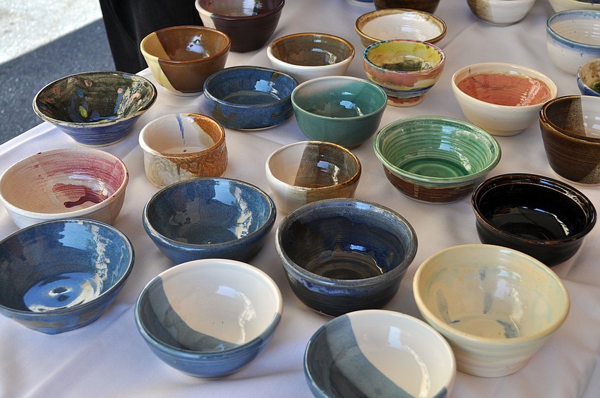 Local potters handcrafted dozens of ceramic bowls for the event.