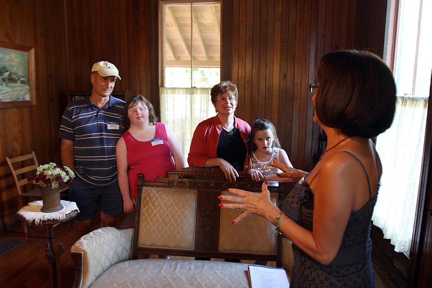 Dave, Kate, Lorraine and Maegan Durinzi listen to Kathryn Chesley, one of the docents inside the Bidwell-Wood House.