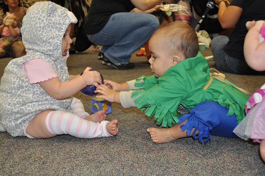 Onalee Cione and Andre Burnell play a game of finder's keepers.