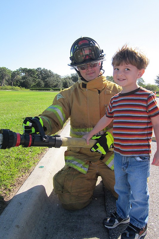 Ethan Hall eagerly tested out the hose.