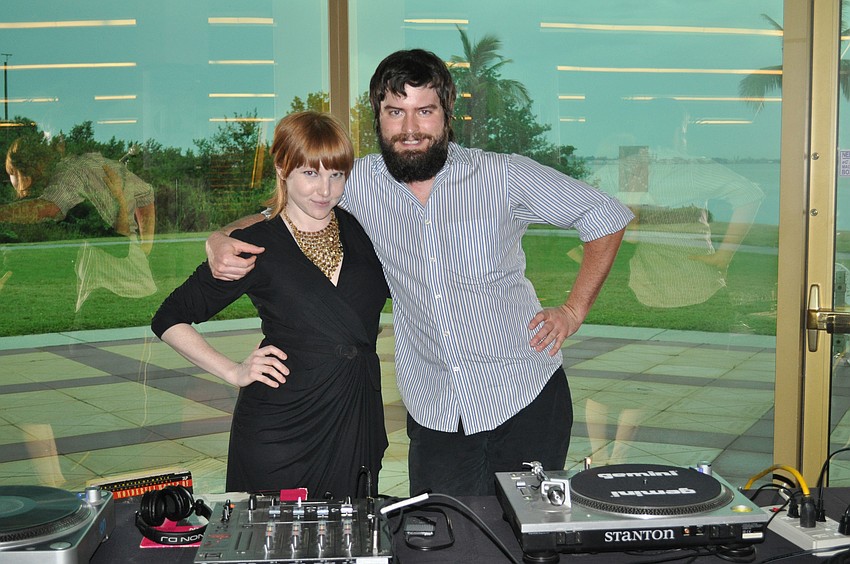 DJ Ew!, Whitney Russell and Eric Barker, provides entertainment