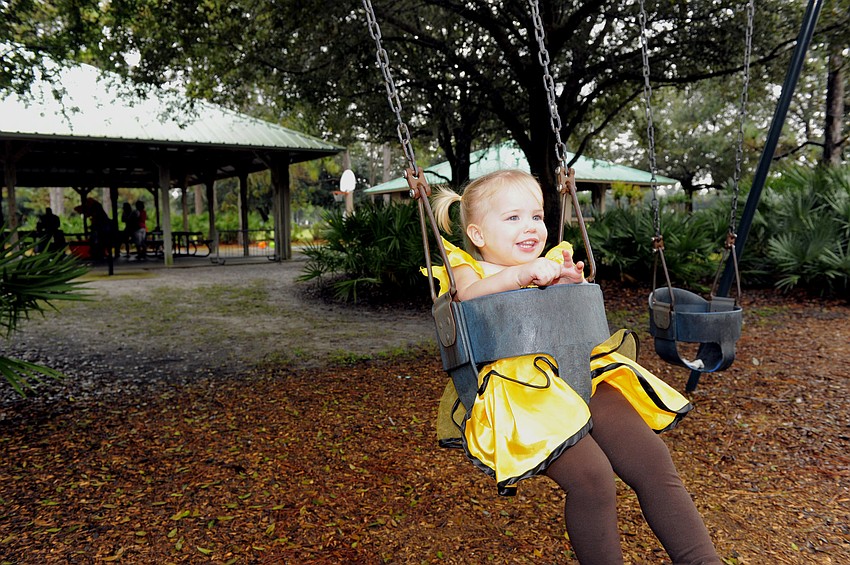 Alyssa Otterness, 20 months, didnâ€™t want to stop swinging.