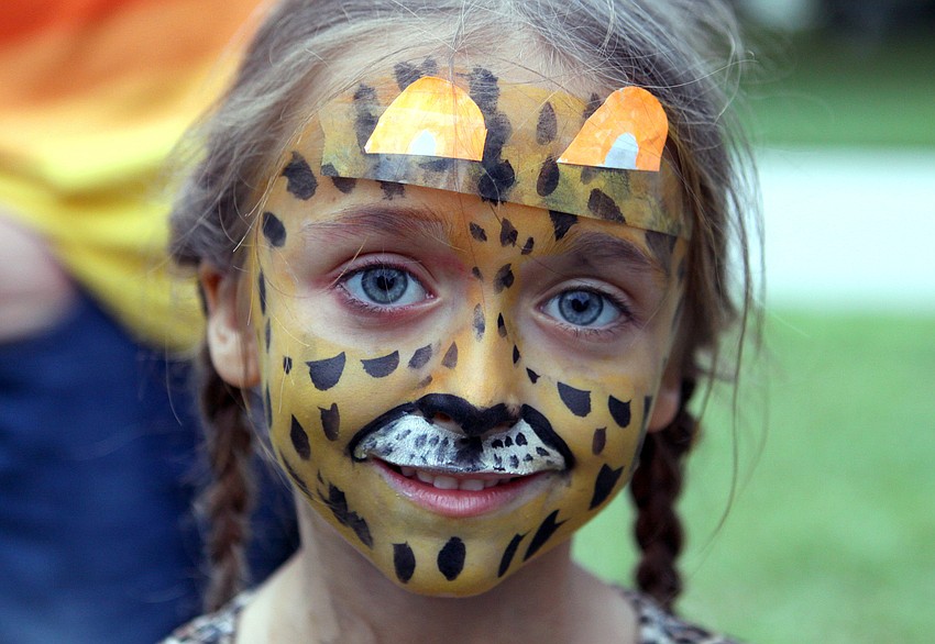 Hana Knowlton, 6, had help from her dad to look like a leopard.