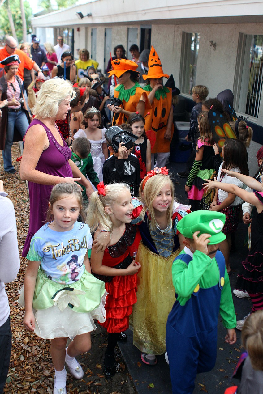 Students have fun making their way through the halls of Out-of-Door Academy as part of the costume parade, Monday, Oct. 31, at Out-of-Door Academy.