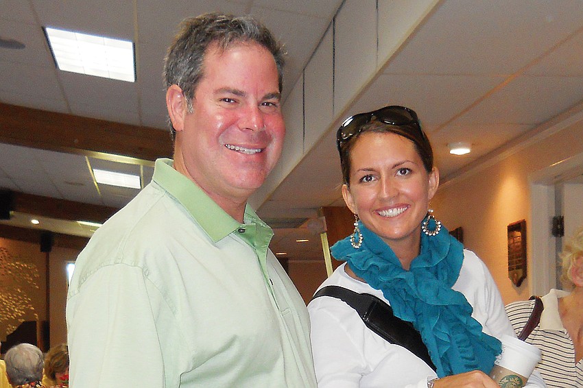 Marcus Spiegelman and Cathy Chung helped themselves to some kugel.