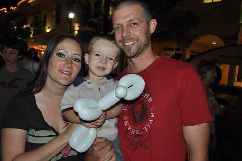 Korinn and Jeff Radcliffe made sure to get a balloon animal for their son, Blaine.