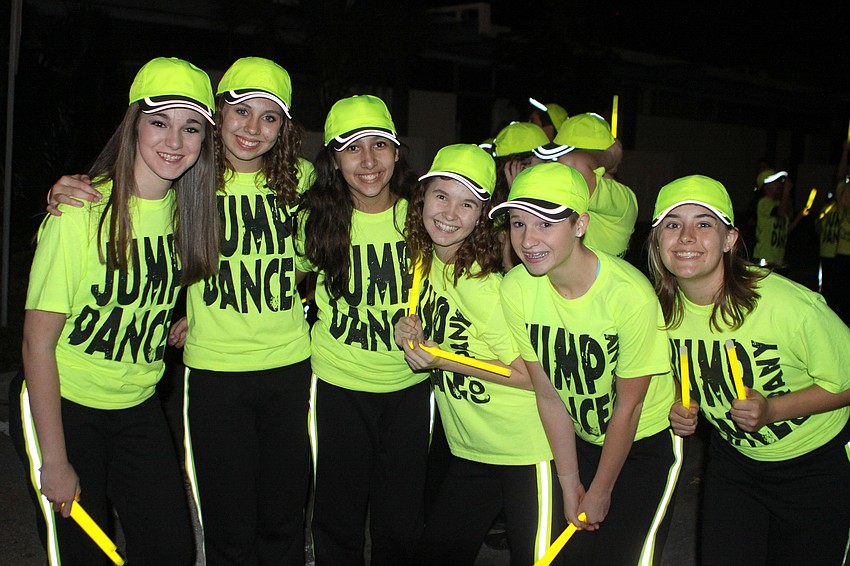 Jump Dance members Taylor Jones, Kellie Holohan, Hannah Mennes, Robyn Bailey, Lexi Wilson and Brianna McVaugh pose together before the start of the parade.