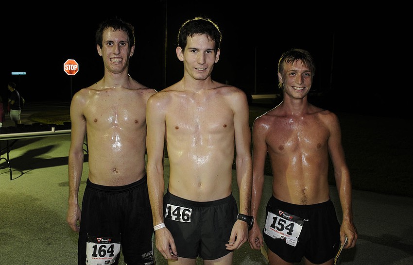 Michael Lamb (center), of Bradenton, won the race with a time of 17:03. Kevin Papac (left), of Bradenton, took third and David Hines (Right), Sarasota High School senior place second.