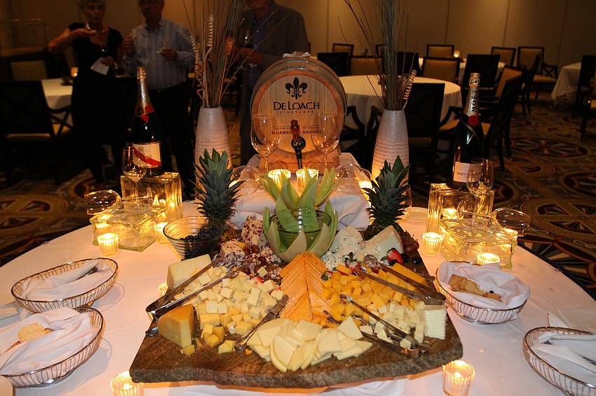 A large cheese platter was set out in the middle of the room for people to snack on during the Observer Cup Challenge Cocktail Party.