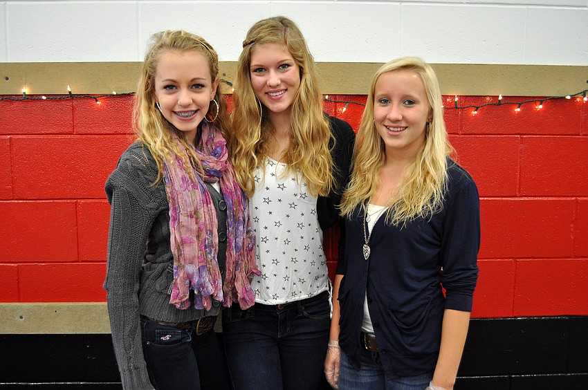 Eighth-graders Siobhan Morley, Layne Thompson and Caitlyn Corbran are all in National Junior Honor Society.