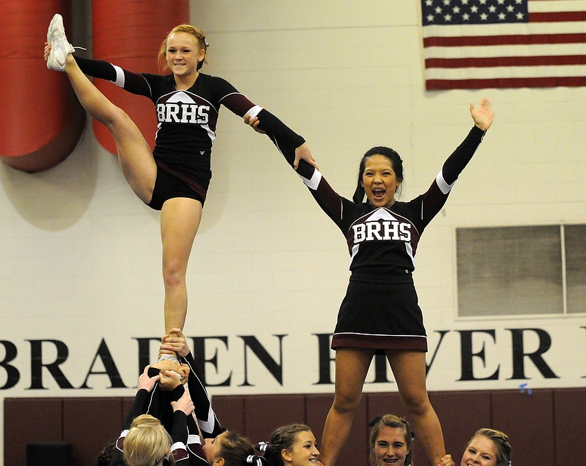 Flyers Cayman Trudell and Michelle Tran hit all of their stunts.