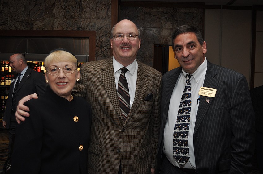 Susan and Scott Levison and candidate for State Attorney Peter Lombardo