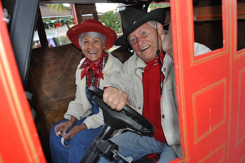 Gerry Jannett and Joanne Wilson road a stagecoach.