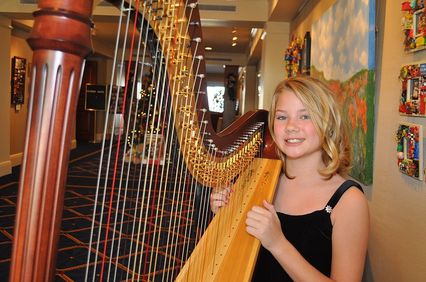 Michelle Gallatin plays Christmas Carols on her harp