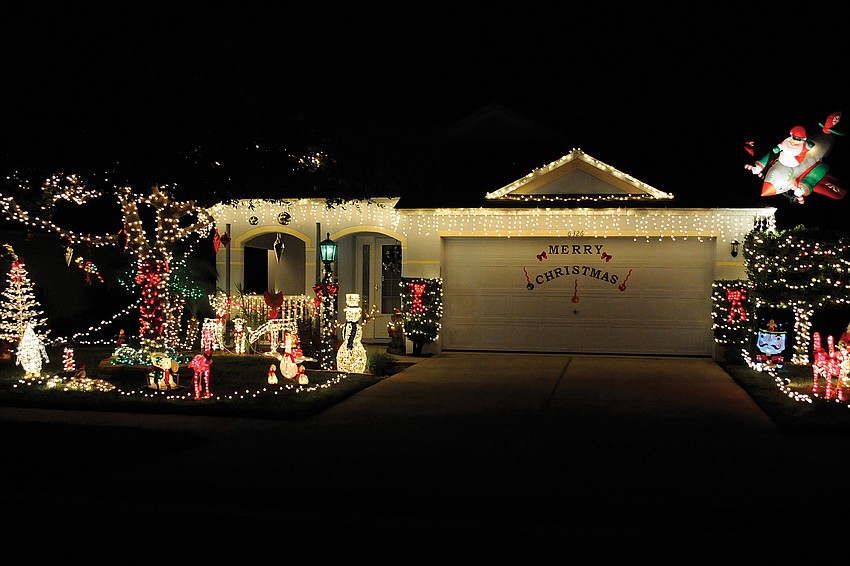 Santa is arriving at this home on Yellow Top Drive in Summerfield not by sleigh but rather by airplane.