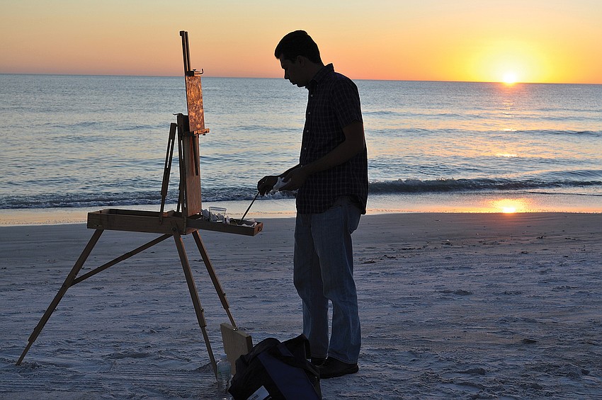 Andy Espinoza completed an art demonstration at sunset in November at the â€œBacchus on the Beachâ€ Stone Crab Celebration and Winemaker Auction held at the Longboat Key Club and Resort.