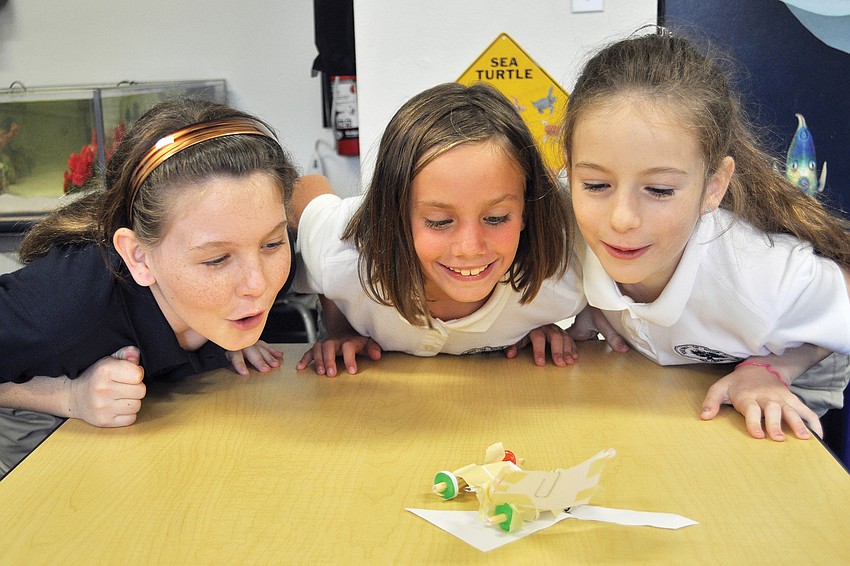 Gillette Bauer, Susan Pacer and Sofia Mascorro sent Life Savers racecars zooming Sept. 8, at The Out-of-Door Academy.