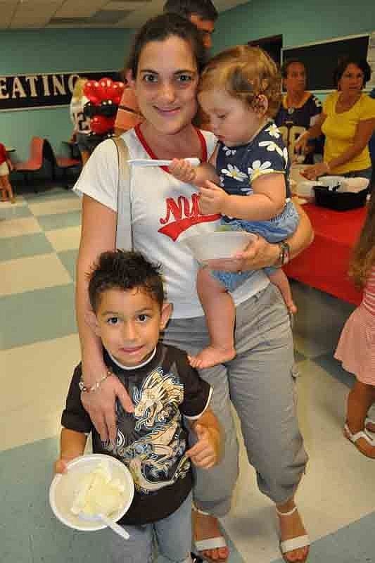 Catherine DeGendice brought out her children, Xander, left, and Alexis, right.