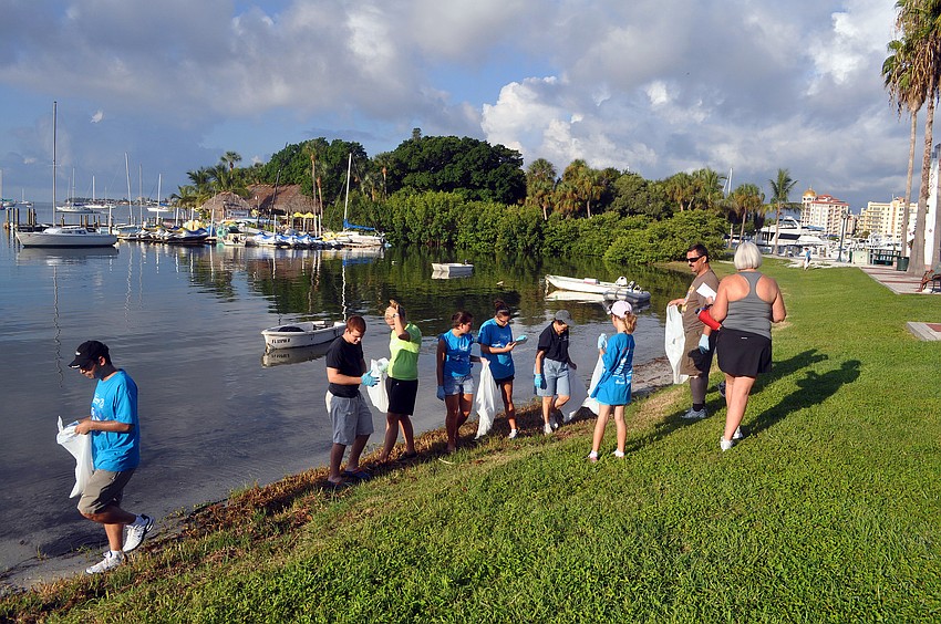 A group of people worked together at Bayfront Park Saturday, Sept. 24, during the International Coastal Cleanup.