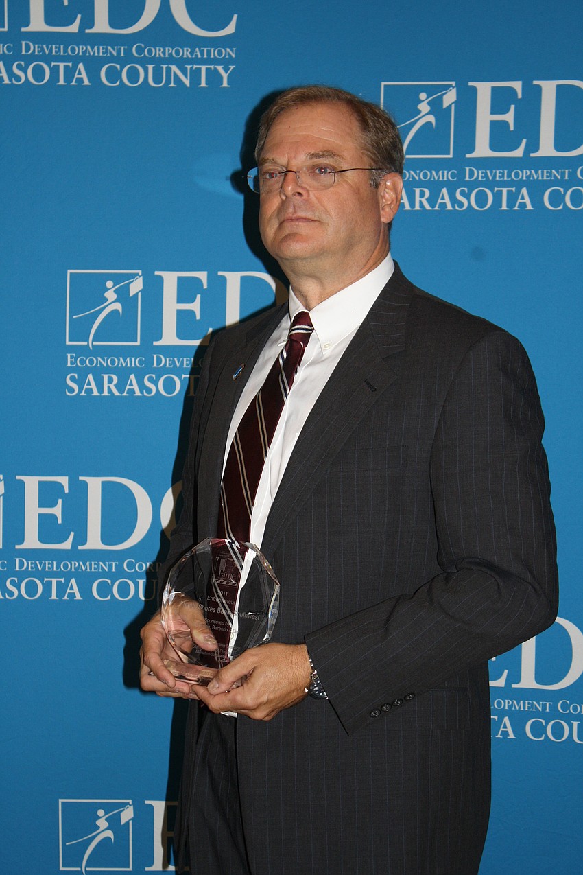 The Entrepreneur Award was presented to Jim Kuhlman of Florida Shores Bank. The award was presented by CPA/Managing Shareholder Rob Lane of Kerkering, Barberio and Co.