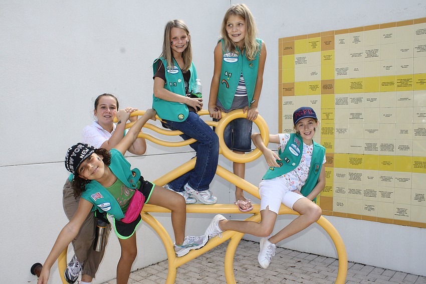 Troop 61 plays together during the 100-year kick-off event. Kyli Hilaire, Iman Zoviten, Kristal Joyner, Cassie Collins and Sara McCurdy are 10 and 11-year-old girl scouts.