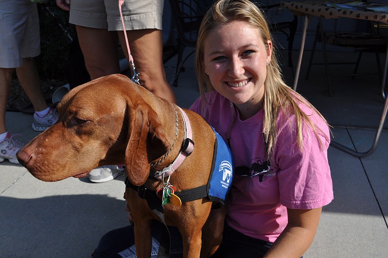 Allie Tomasso brought out her dog, Kelli, an ambassador dog for Southeastern Guide Dogs.