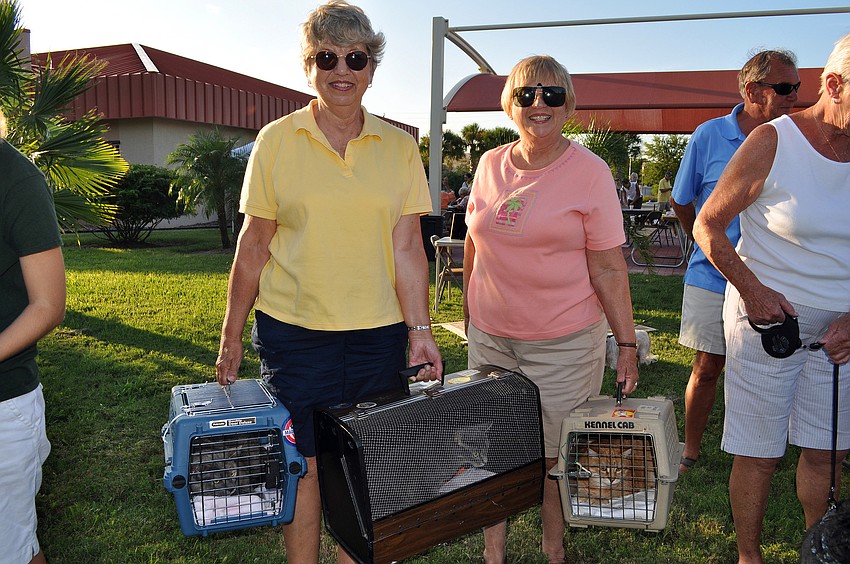 Phyllis Bartram and Gerri Posphala with Jazzi Jane, 9, Sara Sea, 14, and Casi Cay, 13.