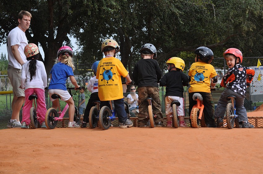 Toddlers line up for a practice run.