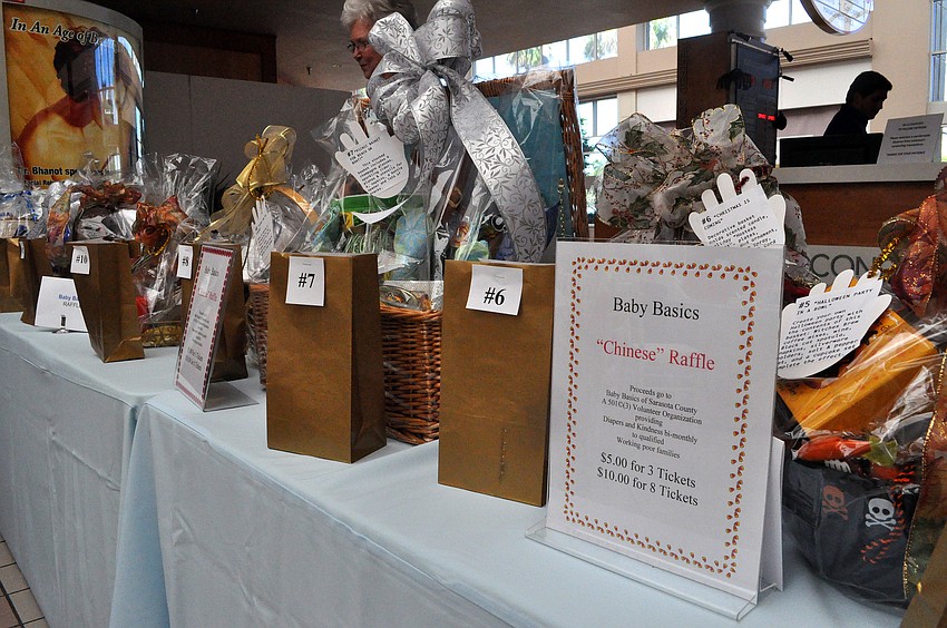There was a Chinese Raffle for people to drop their tickets into, Wednesday, Oct. 26, during the Dillardâ€™s Fashion Show and Luncheon to benefit Baby Basics of Sarasota County at the food court at the Westfield Southgate Mall.