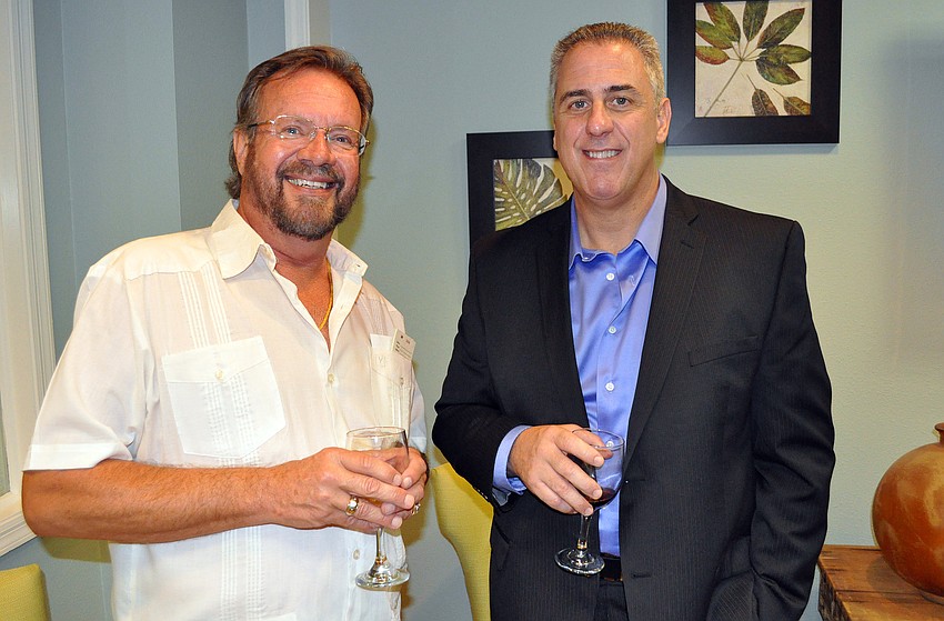 Tom Dickson and John Romano