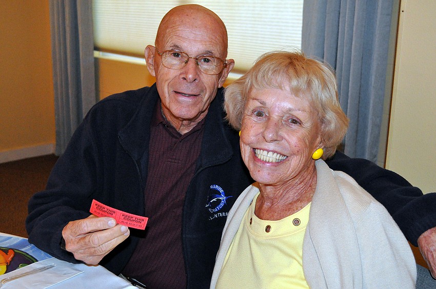 Richard and Patty Kiegler show off their meal tickets.