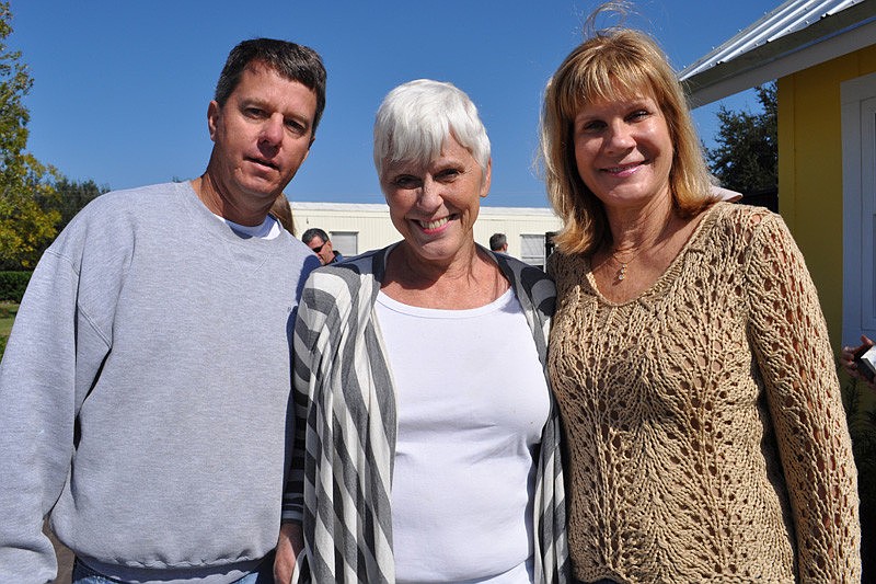 Honor Animal Rescue President Rob Oglesby with Jean Peelen and Manatee County Commissioner Carol Whitmore.