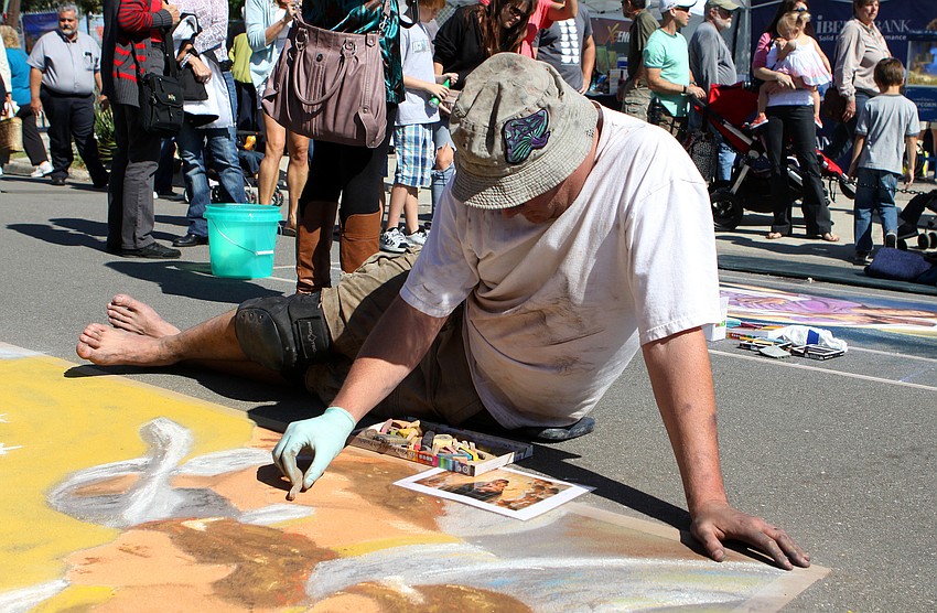 Chris Brake works on his piece for the Sarasota Chalk Festival, Saturday, Nov. 5 in Burns Court.